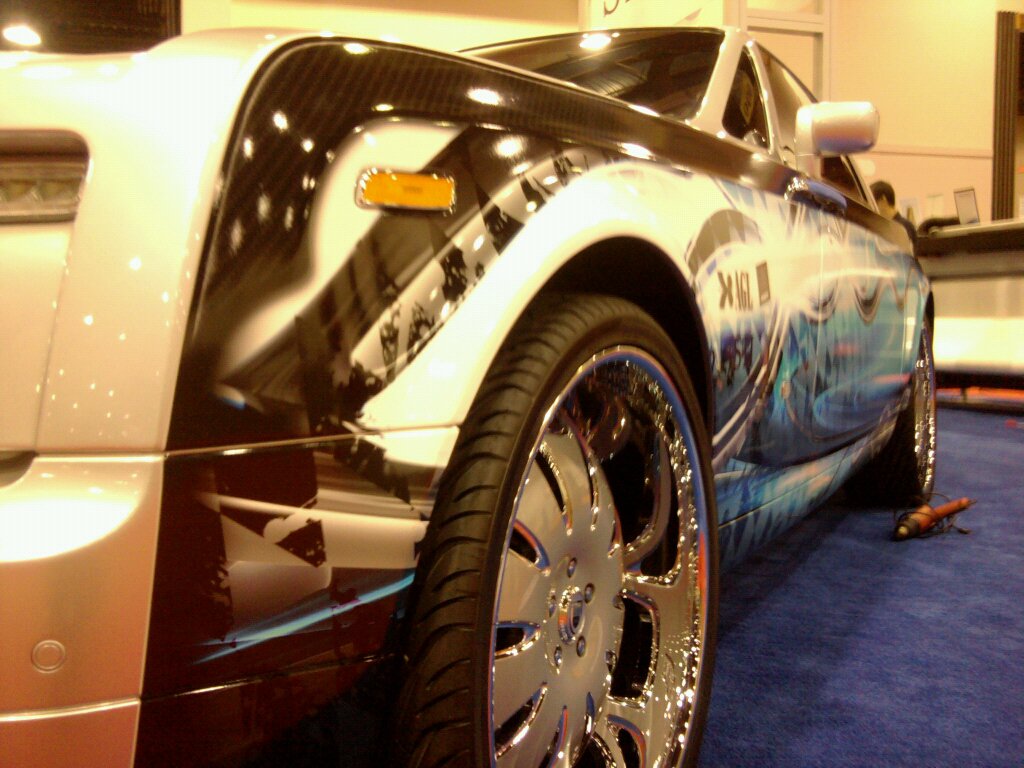 Chrome luxury car wrap by Accents